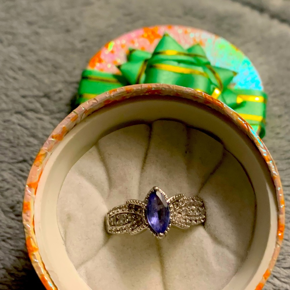 Genuine marquis tanzanite and zircon ring